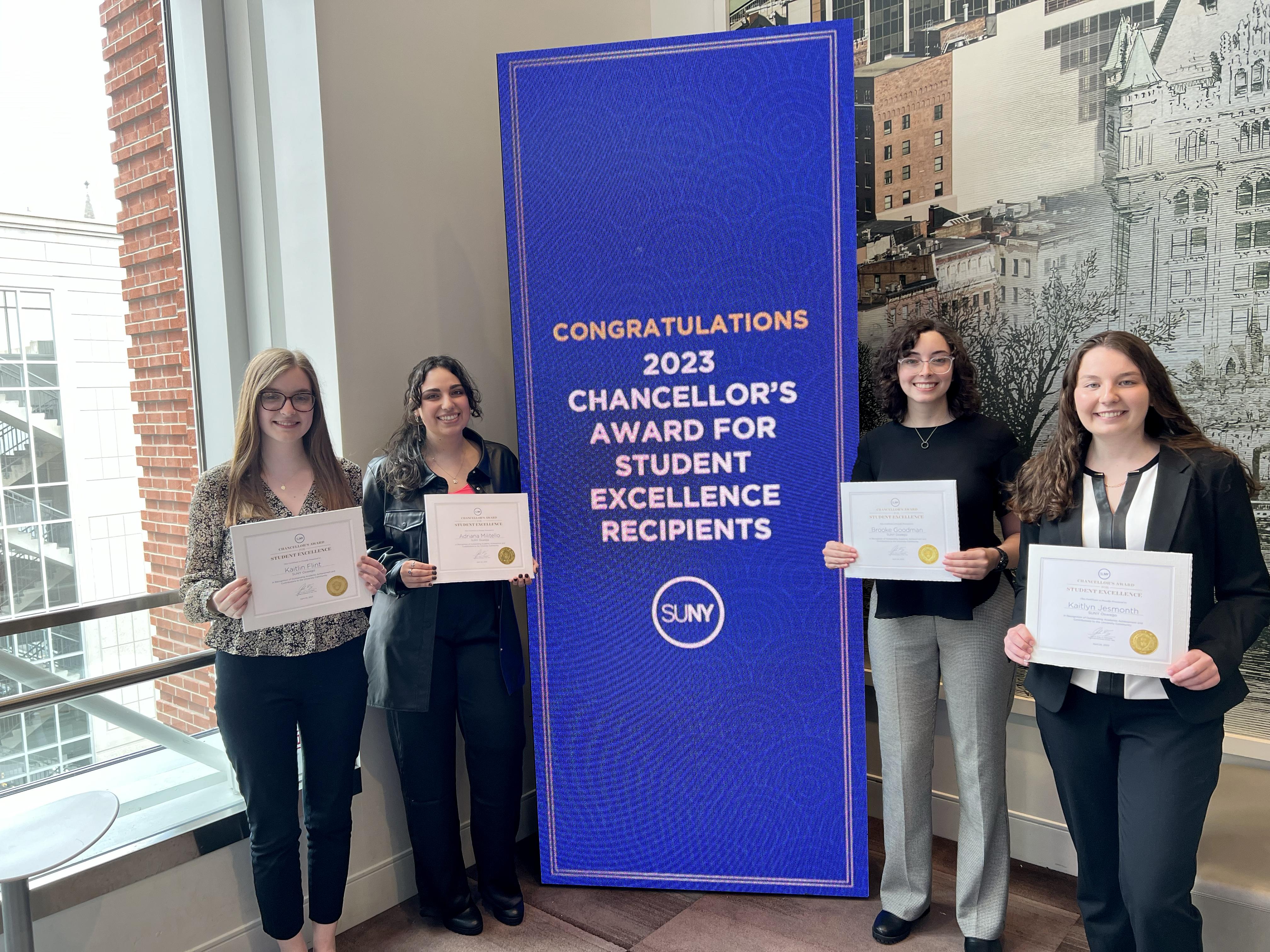 From left, Kaitlin Flint, Adriana Militello, Brooke Goodman and Kaitlyn Jesmonth at the April ceremony in Albany celebrating their Chancellor's Awards for Student Excellence