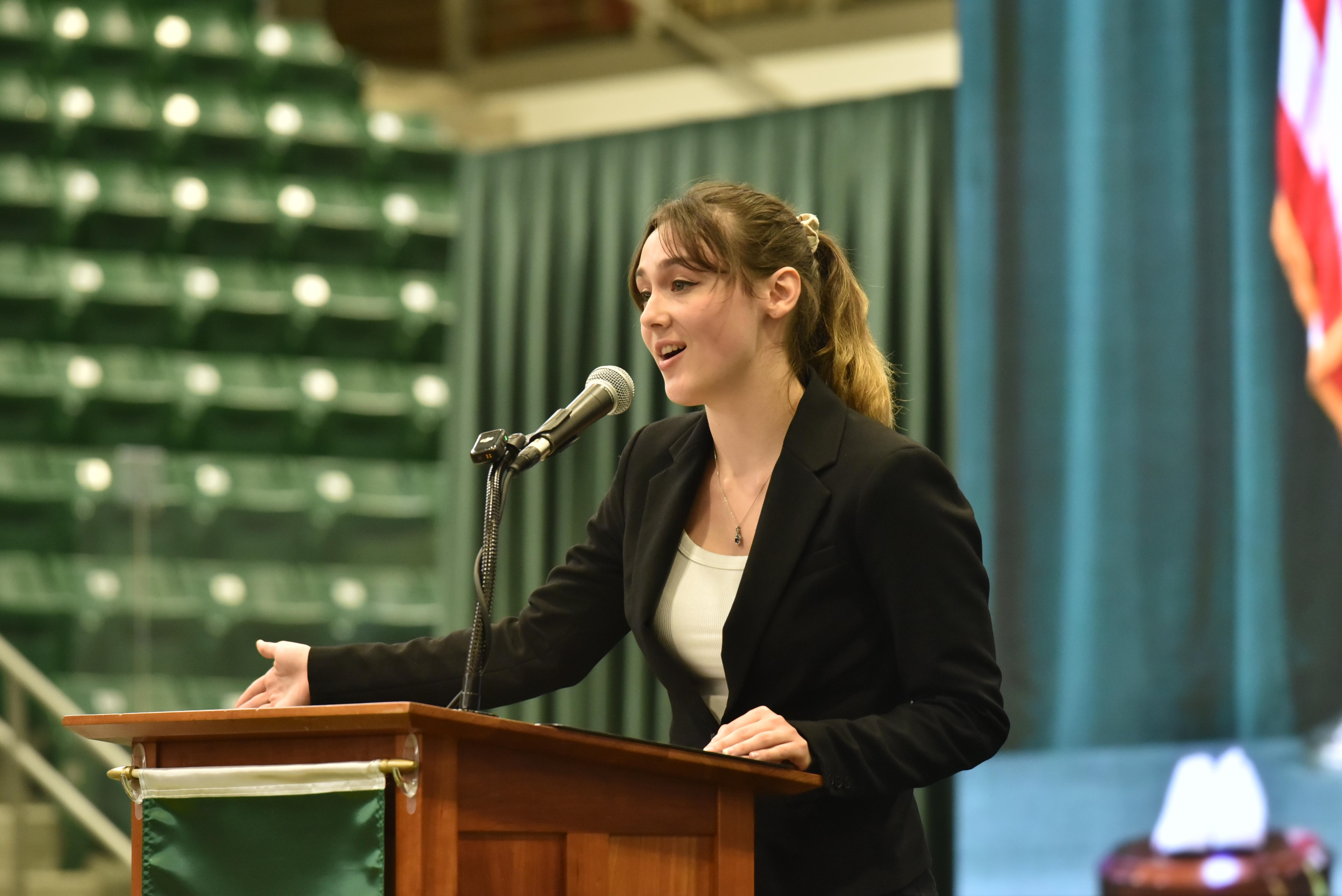 Student poet Emma Deloff speaks during President Peter O. Nwosu's Sept. 27 inauguration