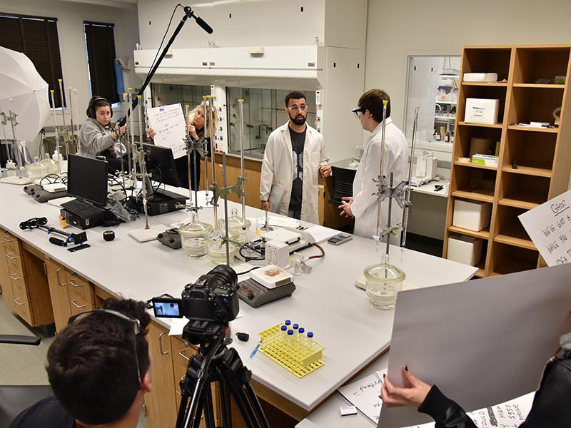 Students work on a film promoting lab safety