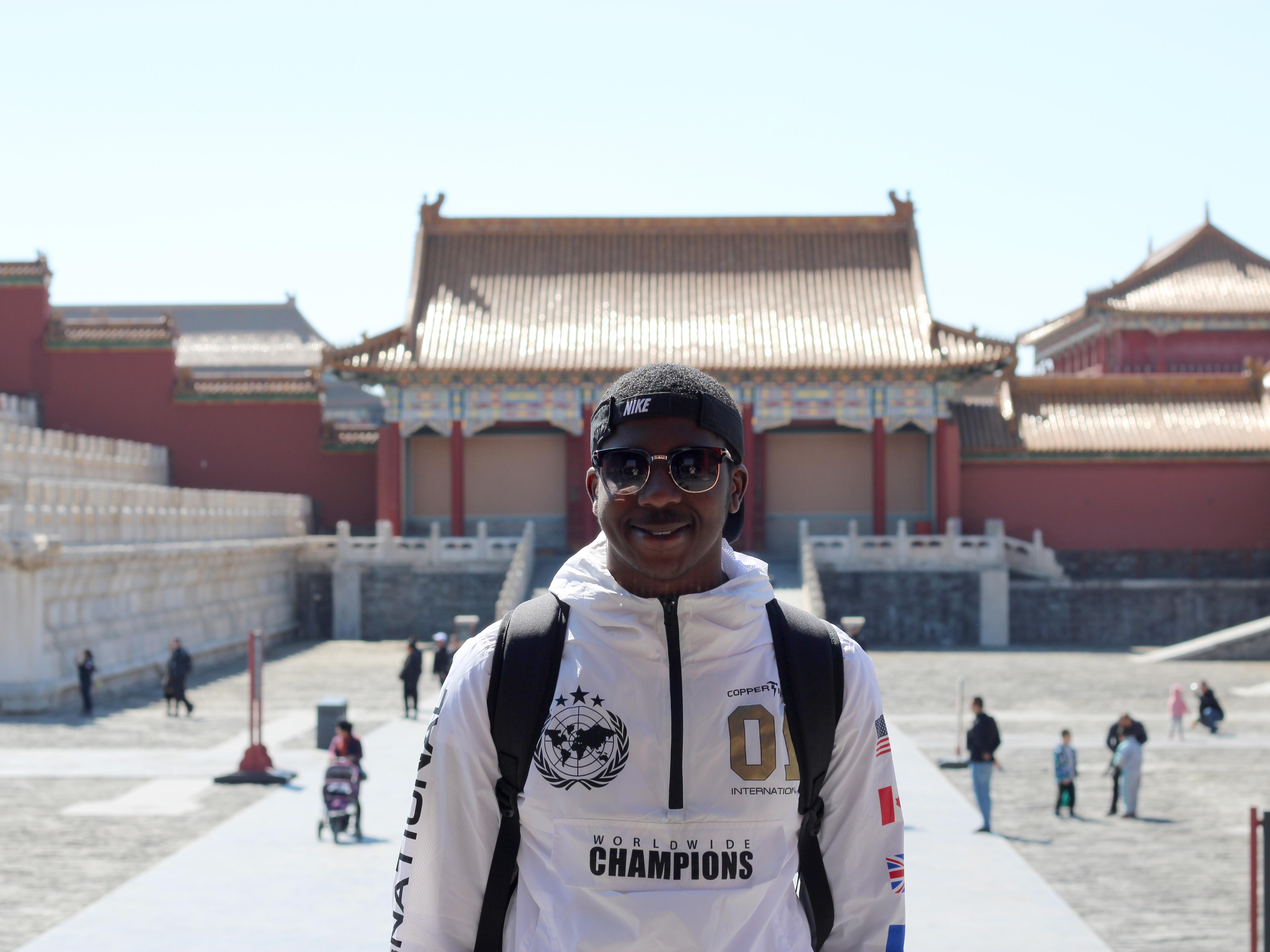Diandre Coote Anderson studying abroad in China, a country where he now pursues an advanced degree