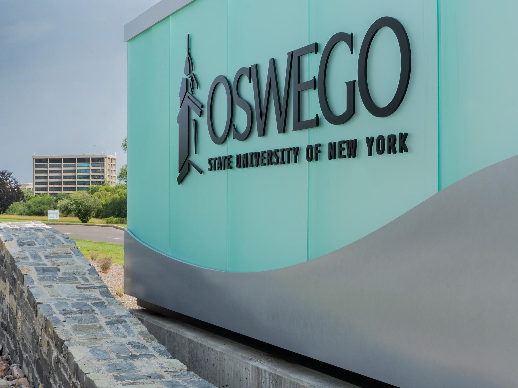 Oswego sign at college entrance