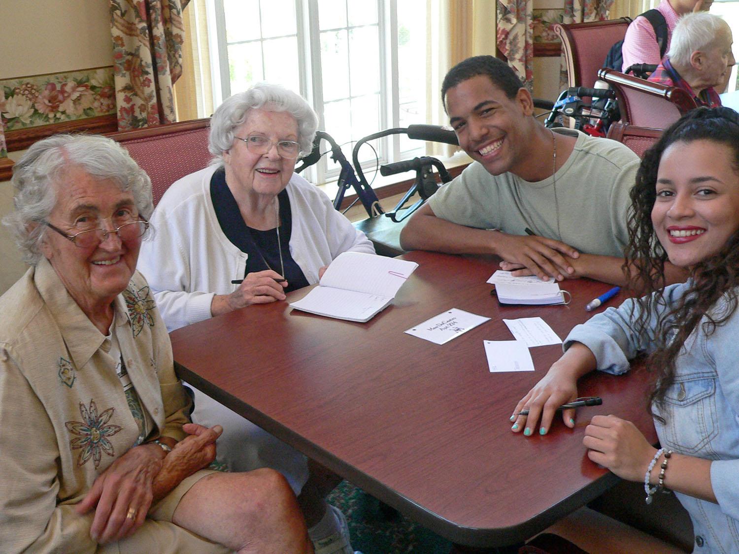 Participants in SUNY Oswego’s summer English Immersion Program made a visit to Bishop’s Commons in Oswego for a chance to practice their language skills while enjoying an afternoon of getting to know local seniors.