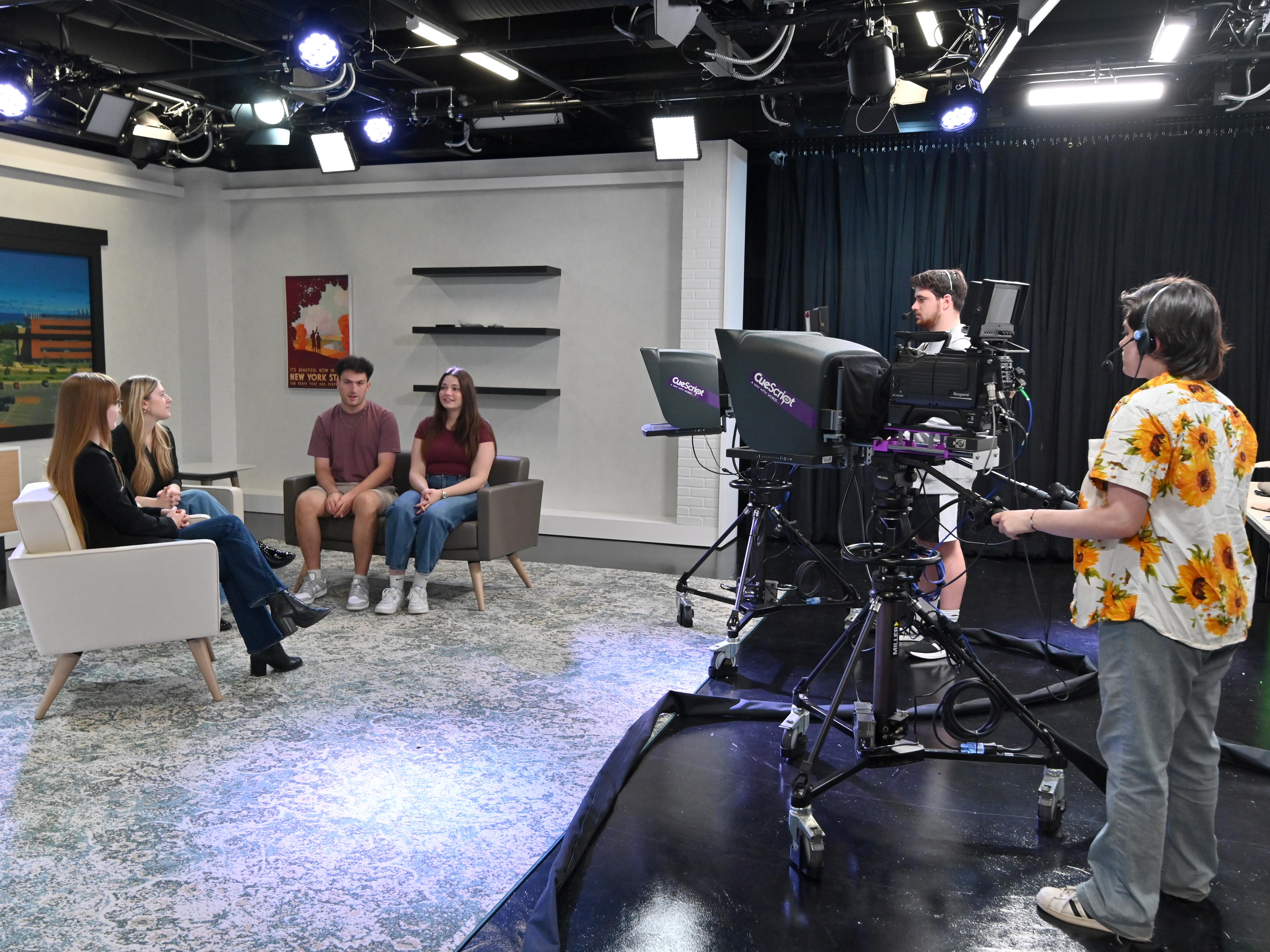 Students work on Hewitt Hall TV studio