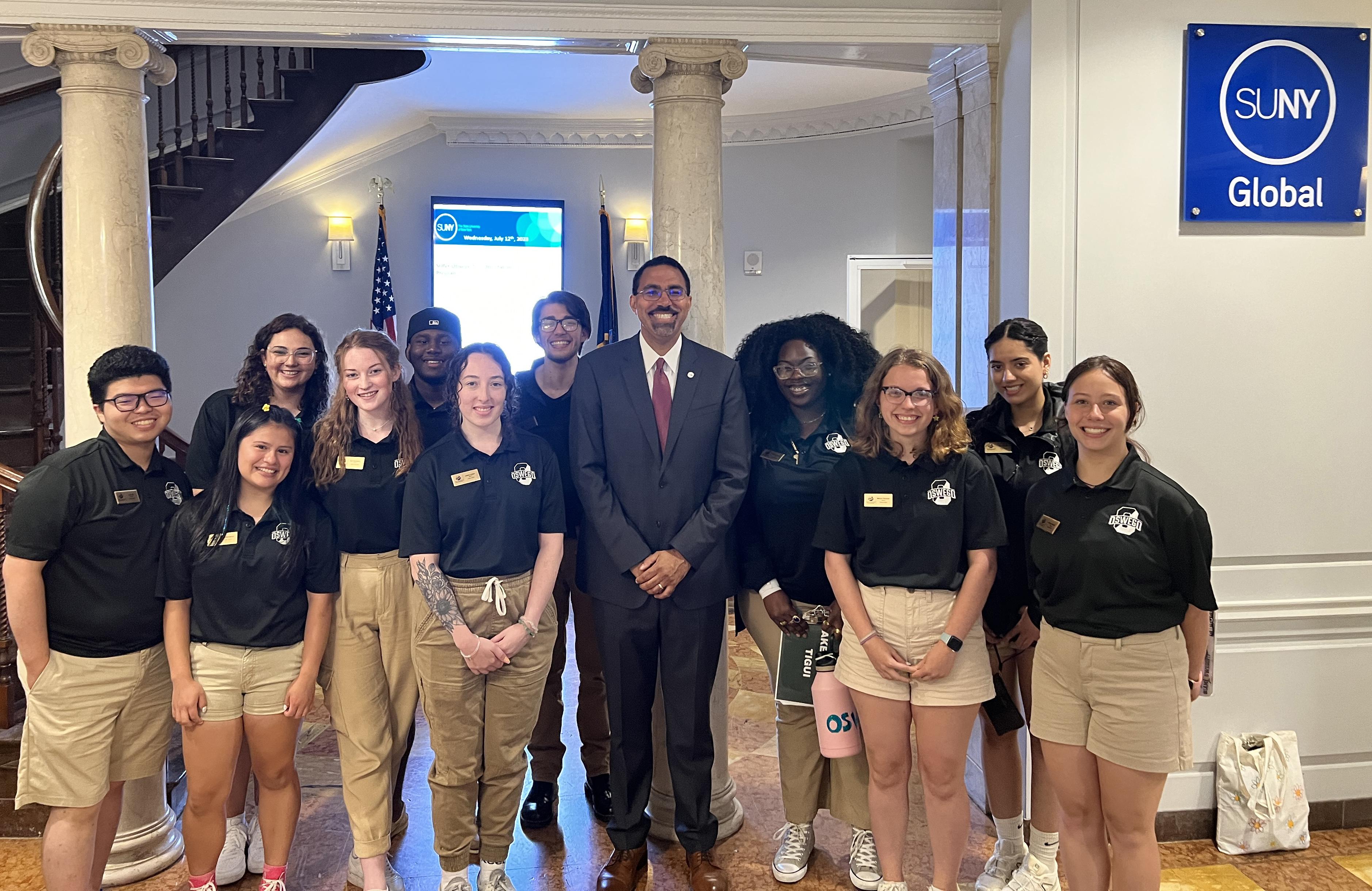 SUNY Chancellor John B. King Jr. visits with Laker Leaders student orientation guides during SUNY Oswego's inaugural Downstate Orientation Program this summer