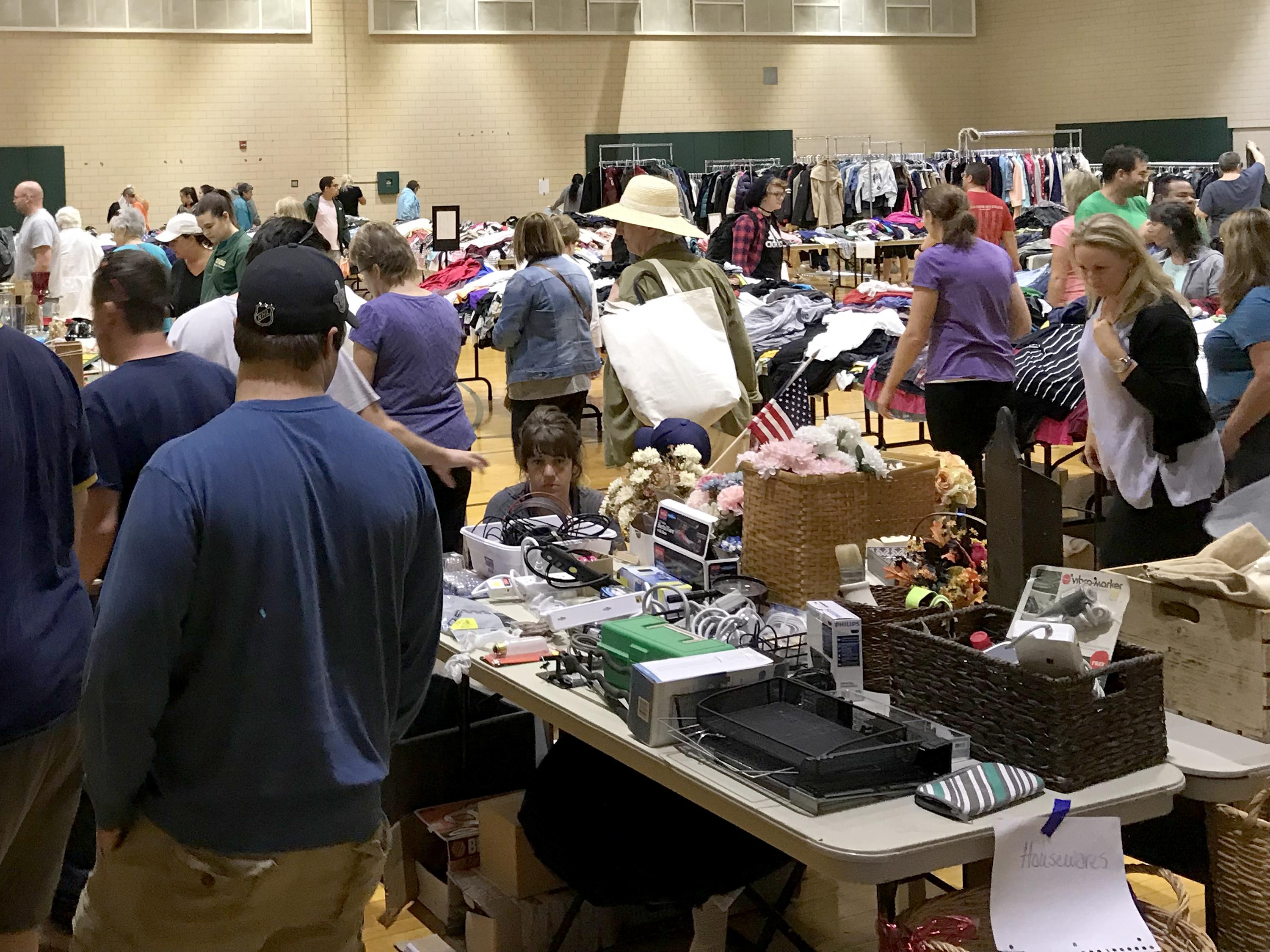 Community members browse for bargains in Leave Green sale
