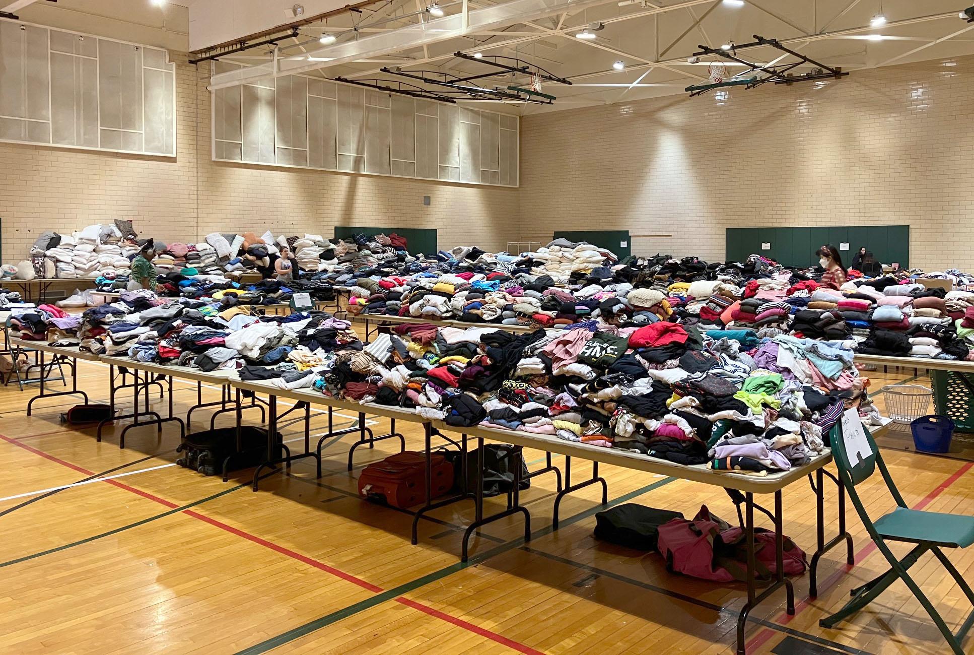 Tables upon tables of clothes fill Swetman Gym during the 2022 OzThrift Sale