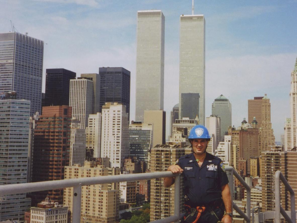 John McLoughlin in Port Authority Police Department uniform in front of the World Trade Center