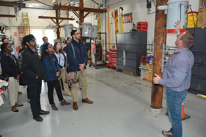 Matt Irland, National Grid overhead line instructor, talks to SUNY Oswego students about the rewards and risks of dealing with electric transmission lines