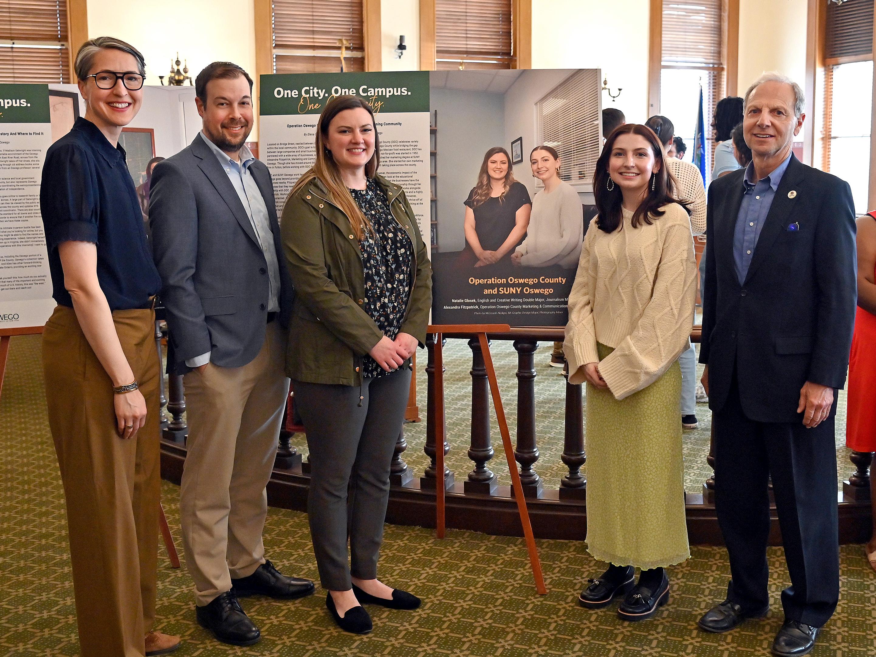 SUNY Oswego Assistant Vice President for Workforce Innovation and External Relations Kristi Eck; Austin Wheelock and Alexandra Fitzpatrick of Operation Oswego County; Natalie Glosek, an English and creative writing major; and Oswego Mayor Robert Corradino
