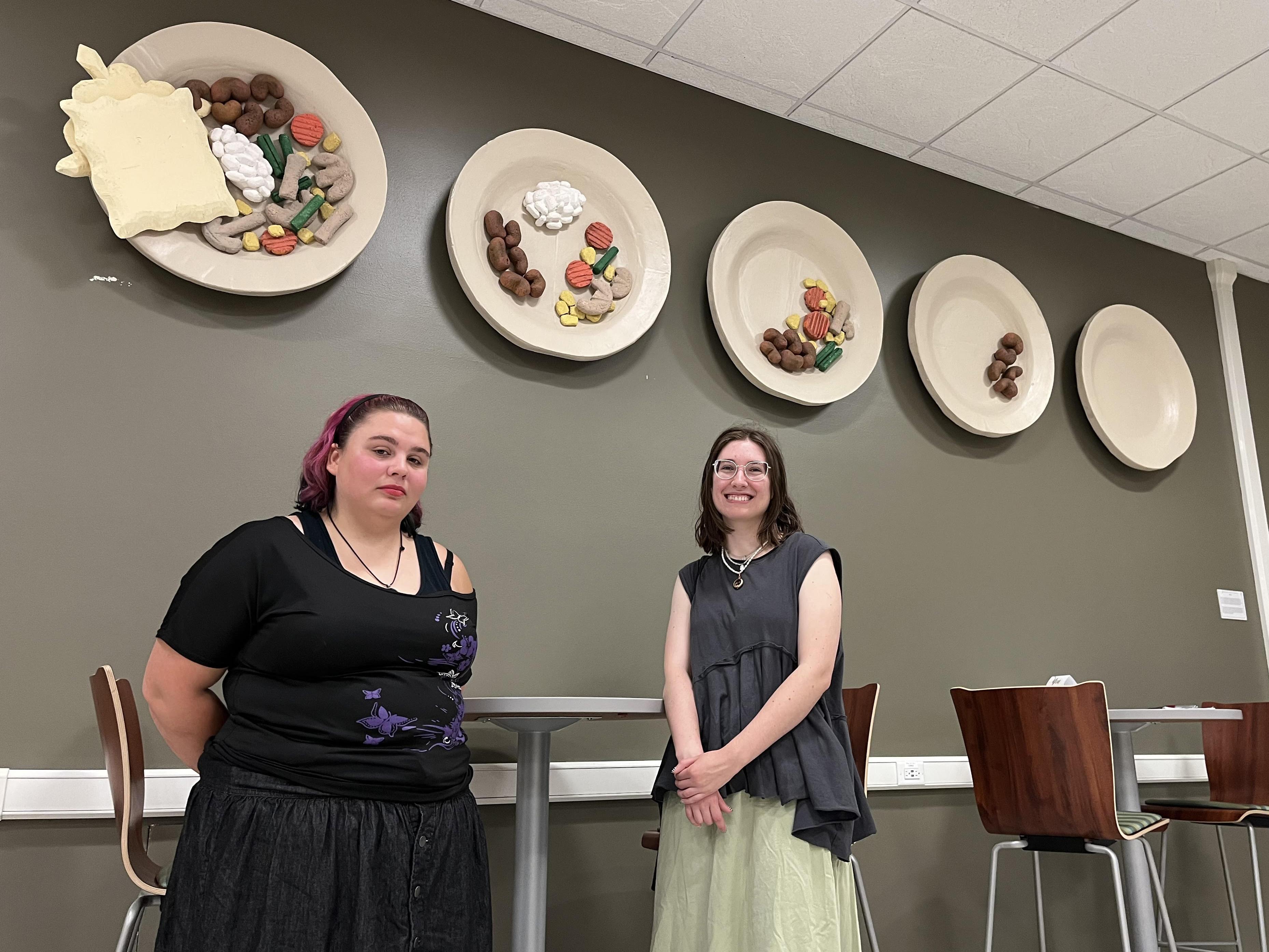 Seniors Suzan Bean and Caitlin Marx led the sculpture project titled Potluck that calls attention to the SHOP pantry's services for students in need