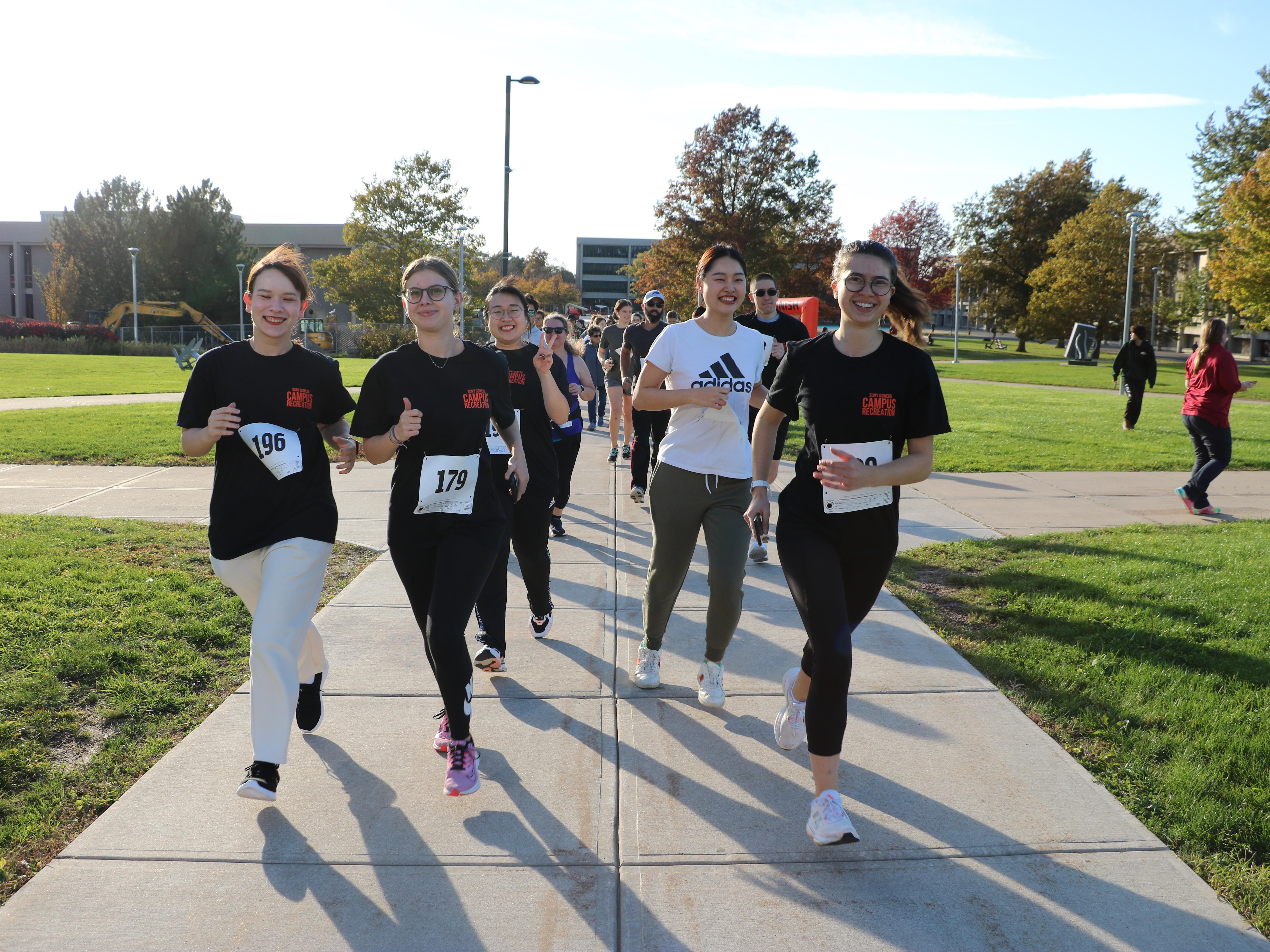 Students take part in the Great Pumpkin Run, part of the menu of Family and Friends Weekend activities Oct. 20 to 22