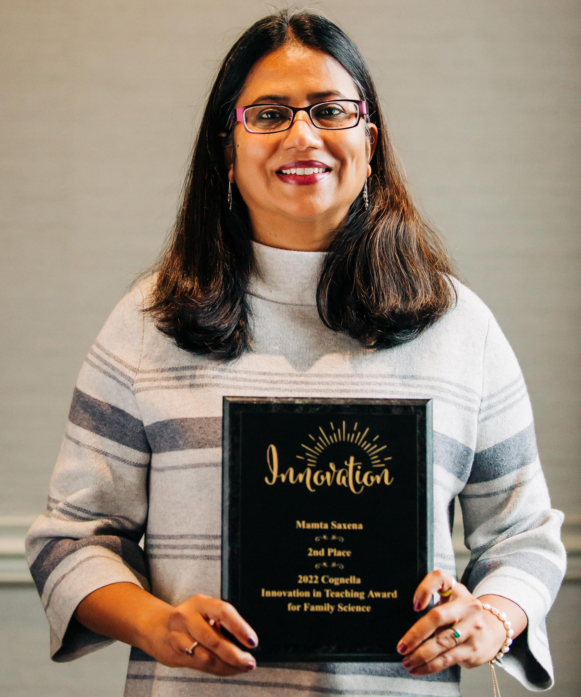 Mamta Saxena of SUNY Oswego’s human development faculty earned an award from National Council on Family Relations