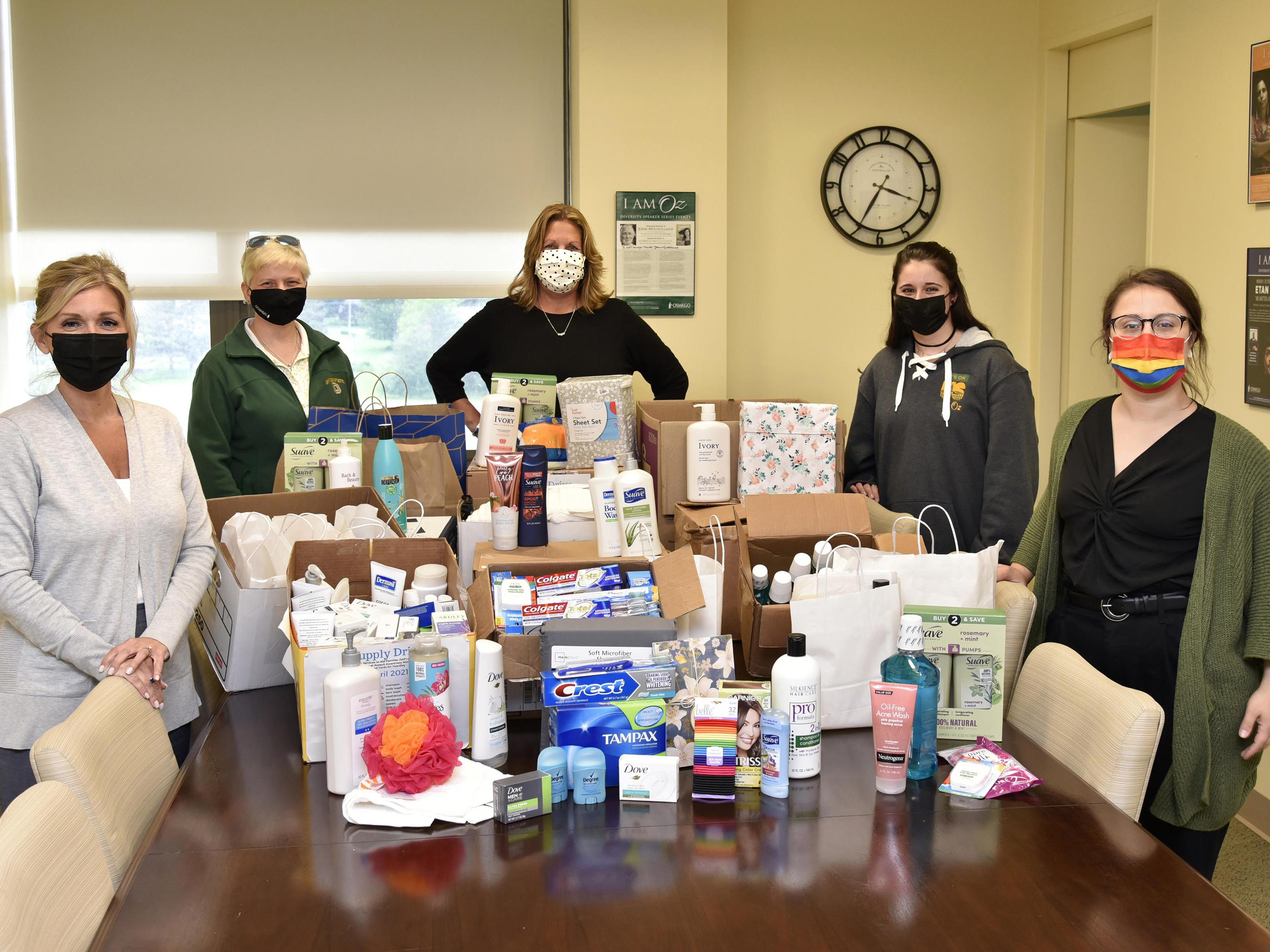 A SUNY Oswego collection drive netting $2000 in materials that will benefit families fleeing domestic violence in Oswego County