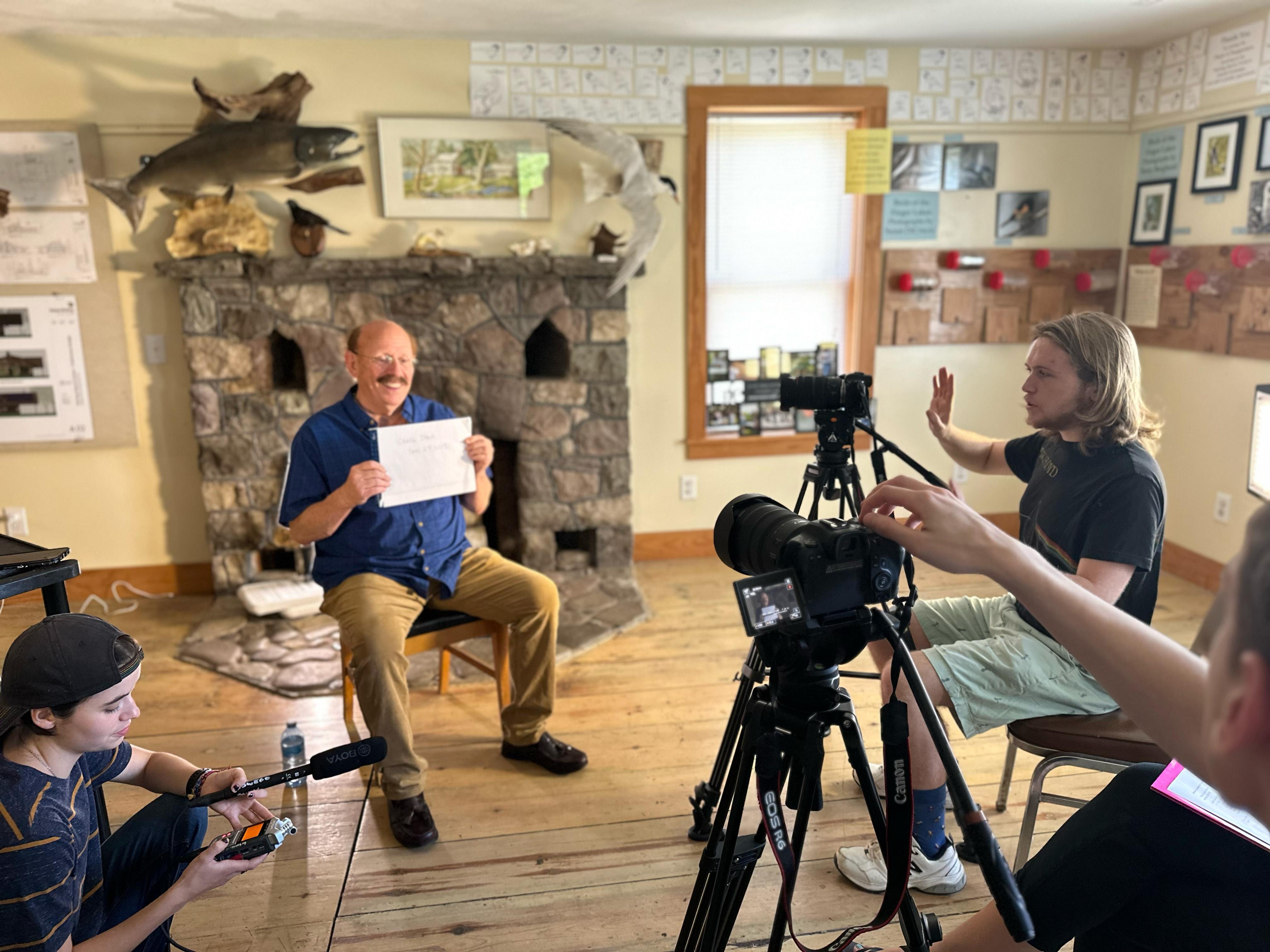 SUNY Oswego students interview Charlie Itzin for a Sterling Nature Center documentary