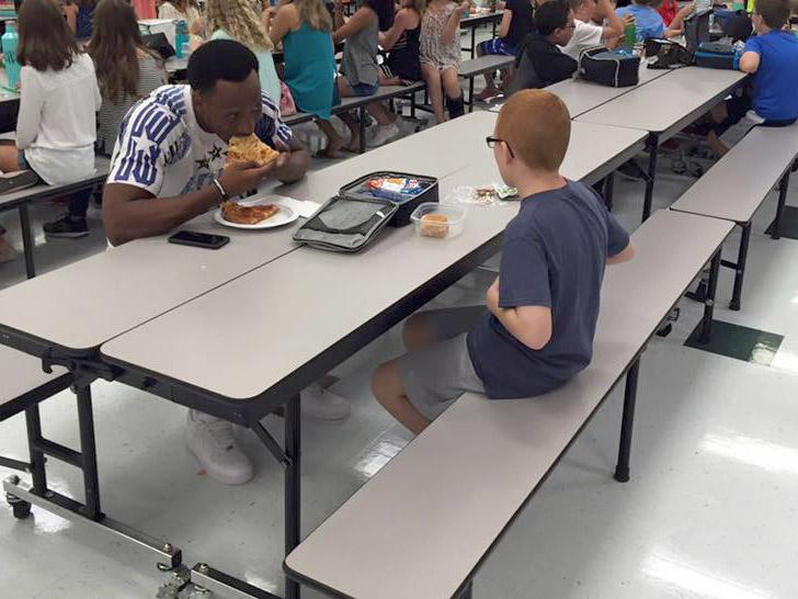 Florida State University football player Travis Rudolph chose to sit with a lone, autistic 11-year-old at lunch