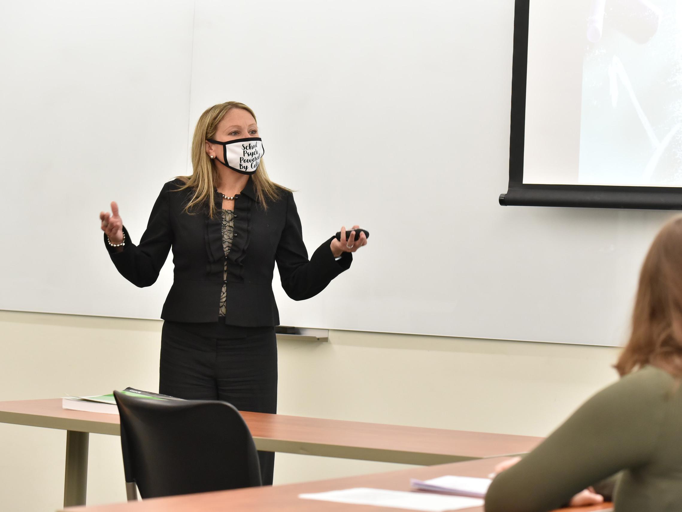Counseling and psychological services faculty member Michelle Storie teaches in a classroom