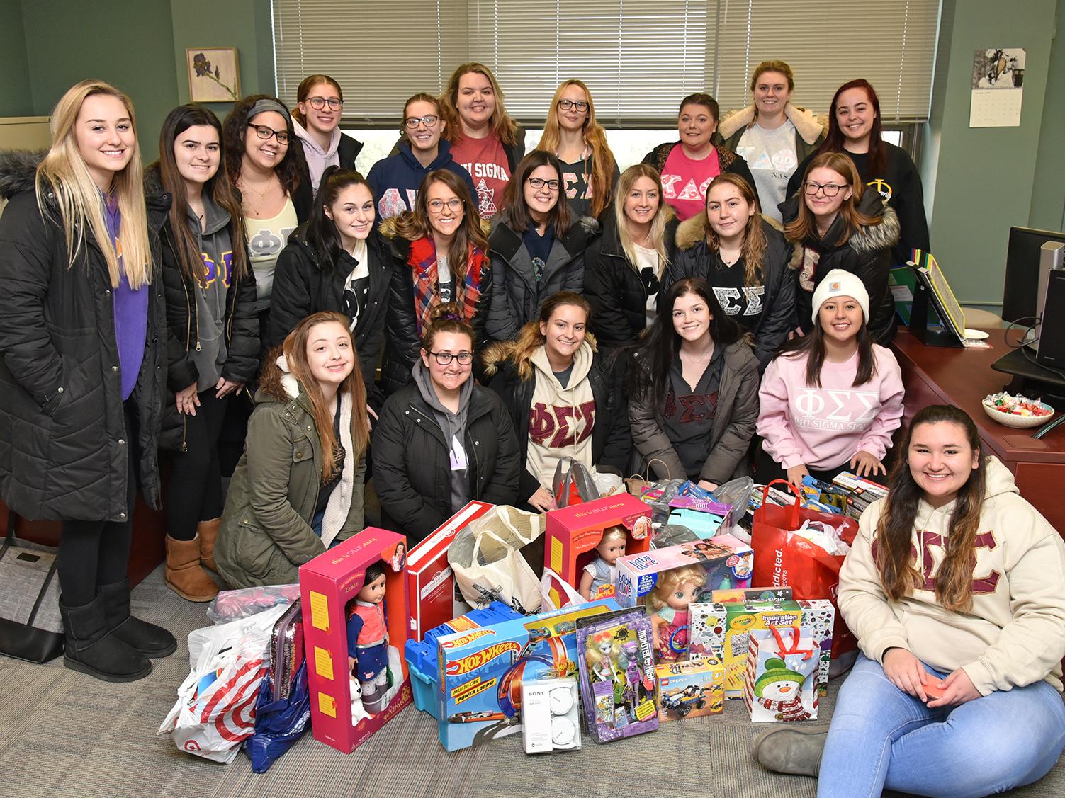 Sororities collected gifts and canned goods for the community