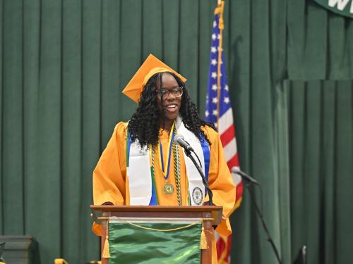 Student Association President Oghenetega “Tega” Adjoh speaks to her fellow the Class of 2026 graduates during May Commencement.