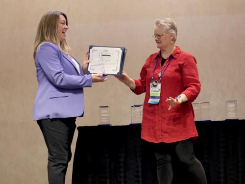Jill Pippin receives an AAACE award for SUNY Oswego's integrative professional studies program