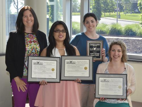 Career Services staff with awards