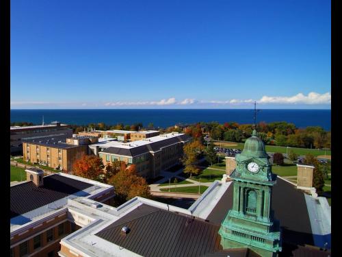 Aerial photo of SUNY Oswego campus overlooking Sheldon Hall