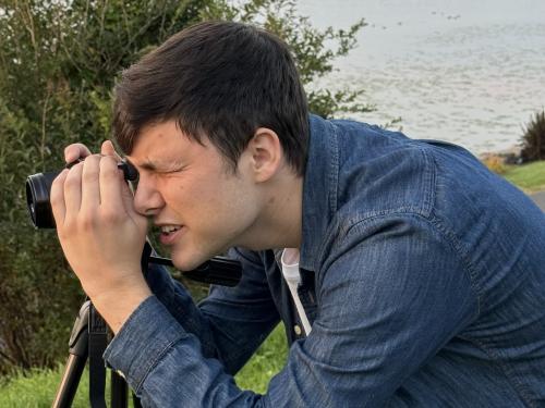 Connor Censak, a SUNY Oswego senior majoring in cinema and screen studies, is among the recipients of the 2023 Lake Placid Film Festival Student Summit Scholarship.