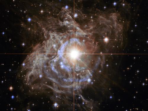  Scientists including SUNY Oswego's Shashi Kanbur use cepheid variable stars like the pulsating RS Puppis (pictured in this NASA image) to try to calculate the size of the universe. 