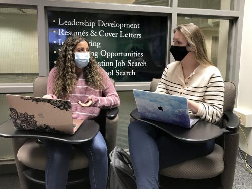 Jaylea Ransom speaks with Tina Cooper; they work together in the internship operation for the Experiential Courses and Engaged Learning Office