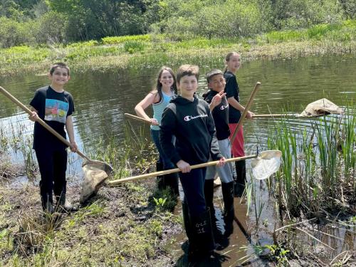 Students from Granby Elementary School explore the wetlands at Rice Creek Field Station