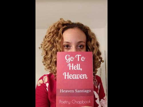 Heaven Santiago with her book of poetry, Go To Hell, Heaven