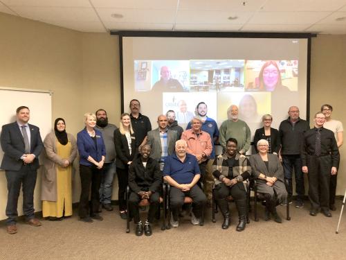 Organizers, participants and partners for SUNY Oswego's first Instructor Bootcamp gather for a celebratory photo during the Nov. 6 closing ceremony