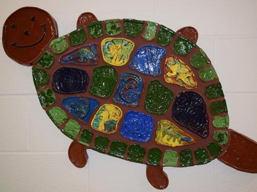Ceramic turtle made by Jowonio schoolchild, part of exhibition