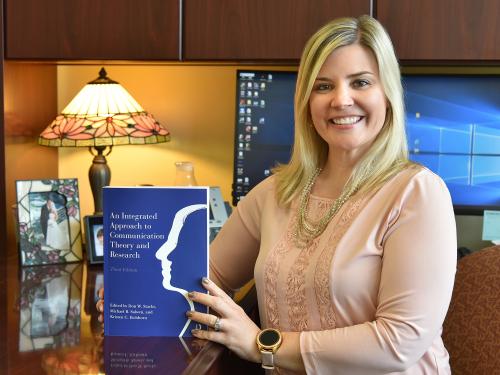 Kristen Eichhorn with revised An Integrated Approach to Communication Theory and Research textbook
