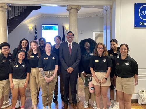 SUNY Chancellor John B. King Jr. visits with Laker Leaders student orientation guides during SUNY Oswego's inaugural Downstate Orientation Program this summer