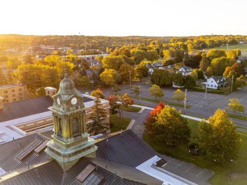 Sun reflecting off of Sheldon Hall facing south into the adjoining neighborhood