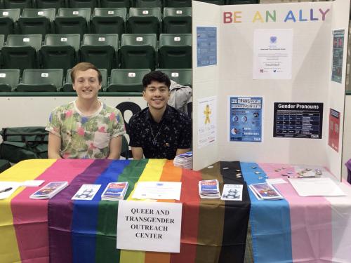 Students with the Queer and Trans Outreach Center participate in the Student Involvement Fair
