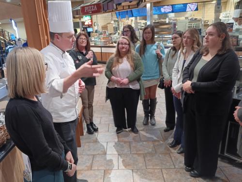 Society of Human Resource Management club members on a field trip to Wegmans' flagship store in Rochester