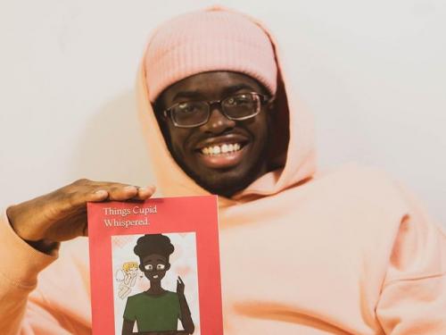SUNY Oswego student Rickey Strachan wit his recent publication, a book of poetry titled “Things Cupid Whispered”