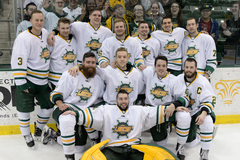 Laker men's hockey players celebrate