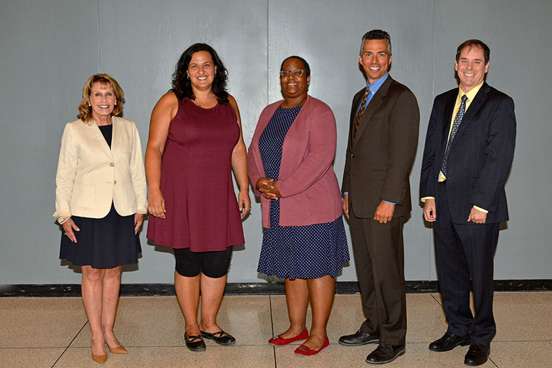 President Stanley with faculty research award winners