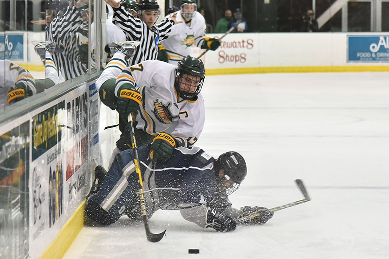 Mitchell Herlihey works with the puck