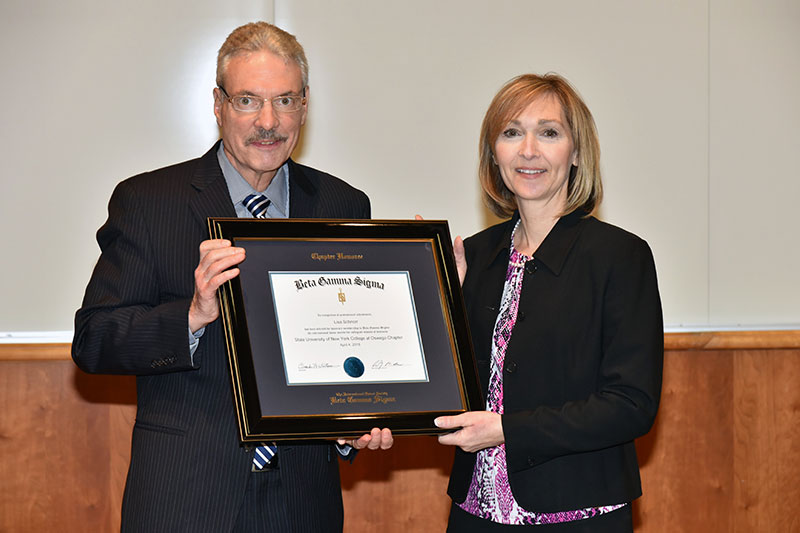 Lisa Marceau Schnorr recognized by Beta Gamma Sigma honor society