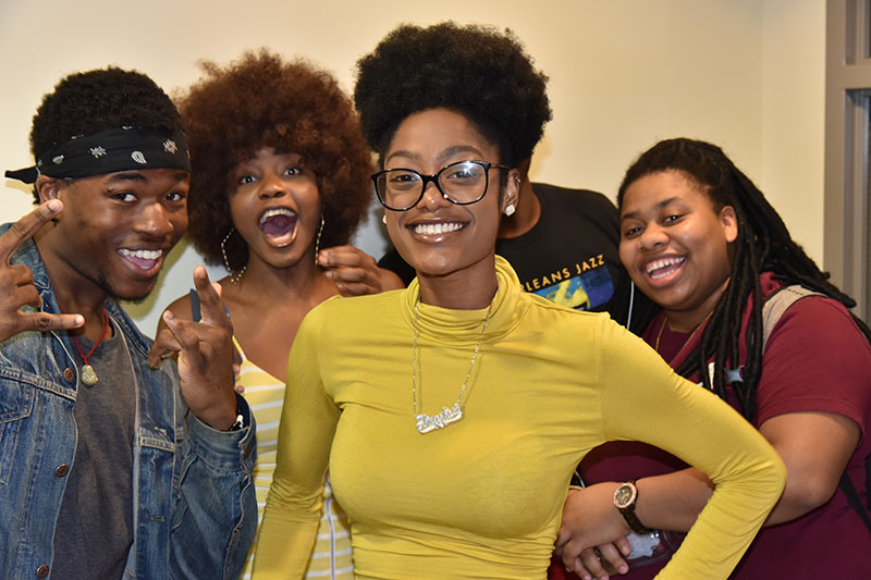 A group of seniors have fun with a photo booth during OzFest