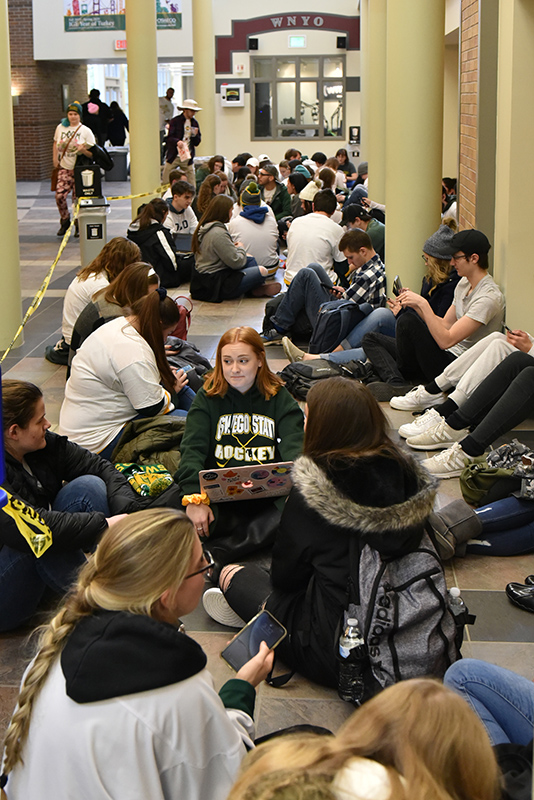 Students wait in line for Oswego-Plattsburgh men's hockey game