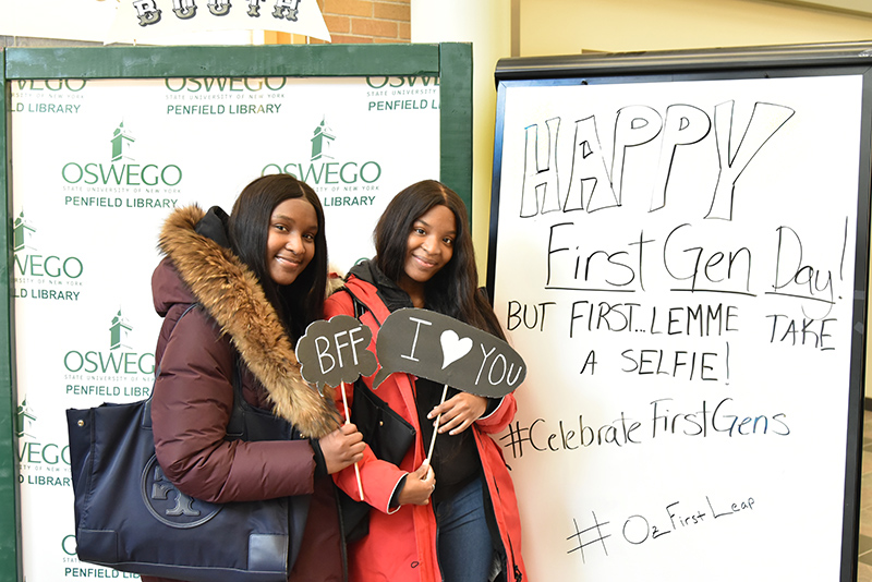 Denasia Wilson (left), a human development major, and Deneisha Wilson, a history major, celebrate First-Generation Students Day