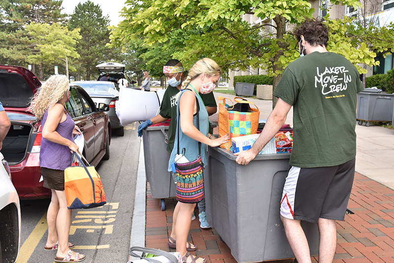 Returning student Annika Wickham, a sophomore journalism major, moves into Seneca Hall on Aug. 21