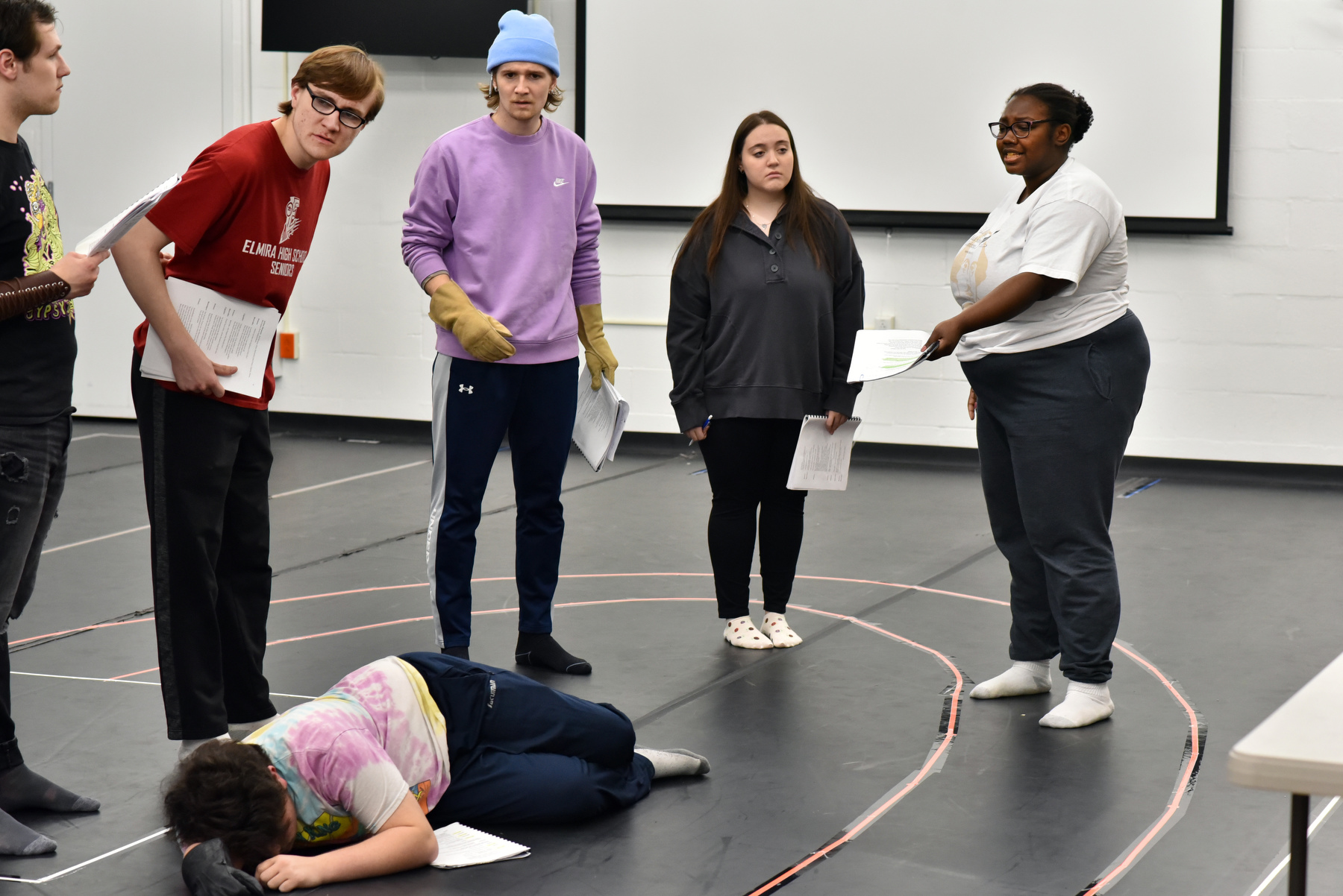 Rehearsals are underway for the Theatre Department's production of “Romeo and Juliet,” the famed play by William Shakespeare. In this scene, pictured, Mercutio, played by Ian Katz, lies wounded after a sword fight while Ziera Taylor (standing at right), playing Lady Capulet, reads lines. The play directed by theatre faculty member Steven Mazzoccone opens April 19 and runs through April 23 in Waterman Theatre, Tyler Hall.