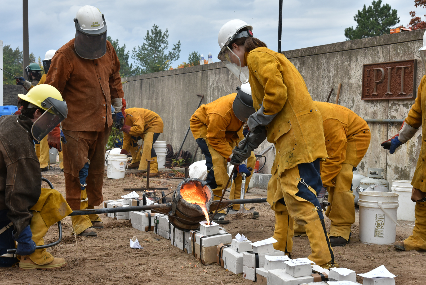 The annual Iron Pour, a collaborative production between the Department of Technology and the Department of Art and Design took place Oct. 20 outside Tyler Hall. During the event, students heated scrap iron until liquefied, then poured it into molds to create original sculpture and designs. Music was provided by students in the Digital Music Association.