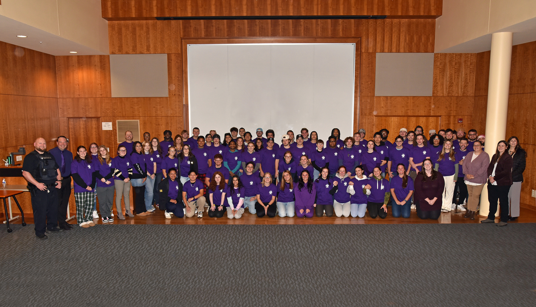 Students gathered for a group photo on Wednesday, Oct. 16, for Wear Purple Day, part of events on campus for Hazing Prevention Week. 