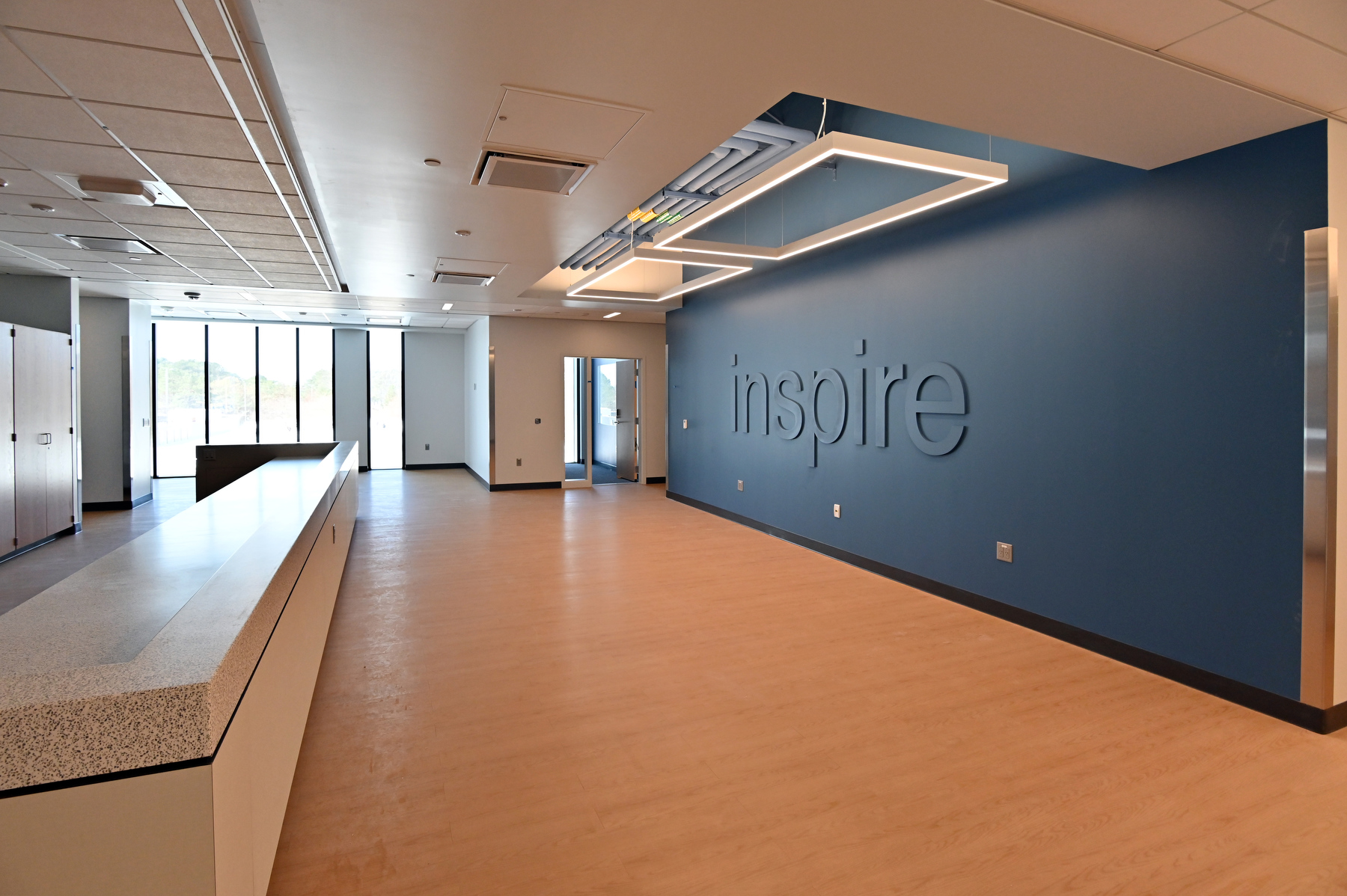 A look inside Hewitt Hall renovations include this mid-February view of a second floor meeting space and offices area with an inspiring message.